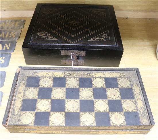Two Chinese lacquer folding chess boards 49.5 sq.